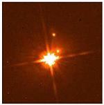 PG 1302-120 und seinen beiden Begleitgalaxien