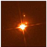 PG 1302-120 und seinen beiden Begleitgalaxien